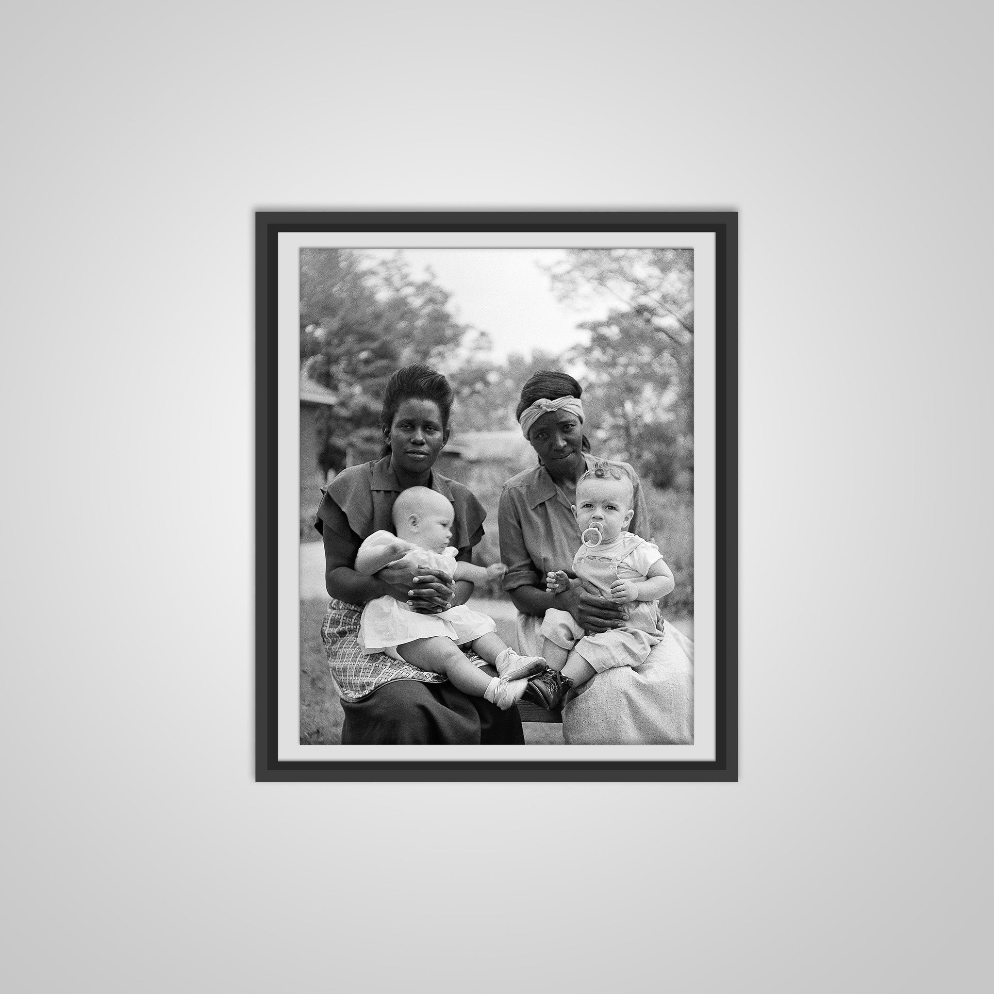 Vintage Photo of Two African American women taking care of white children near Birmingham, Alabama